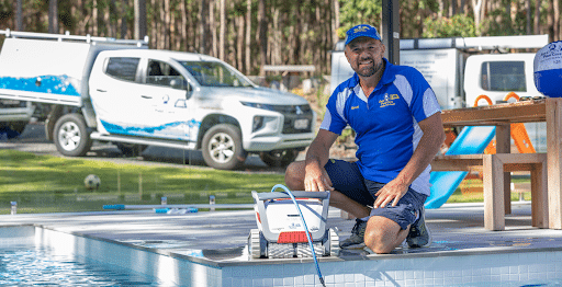 Jim's pool staff with robotic cleaner