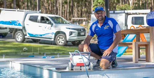 Jim's pool staff with robotic cleaner