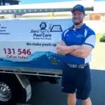 man-standing-by-truck
